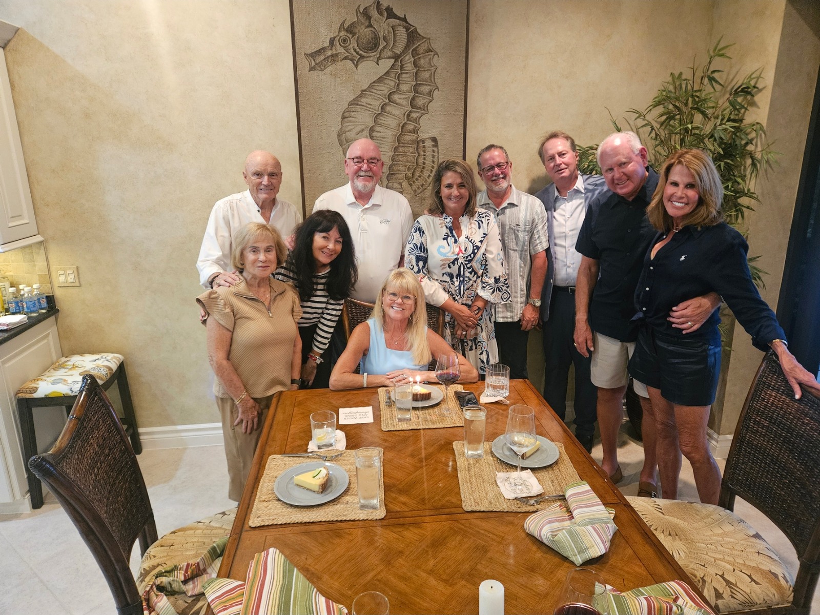 Guests celebrating around the dining table — private chef dinner