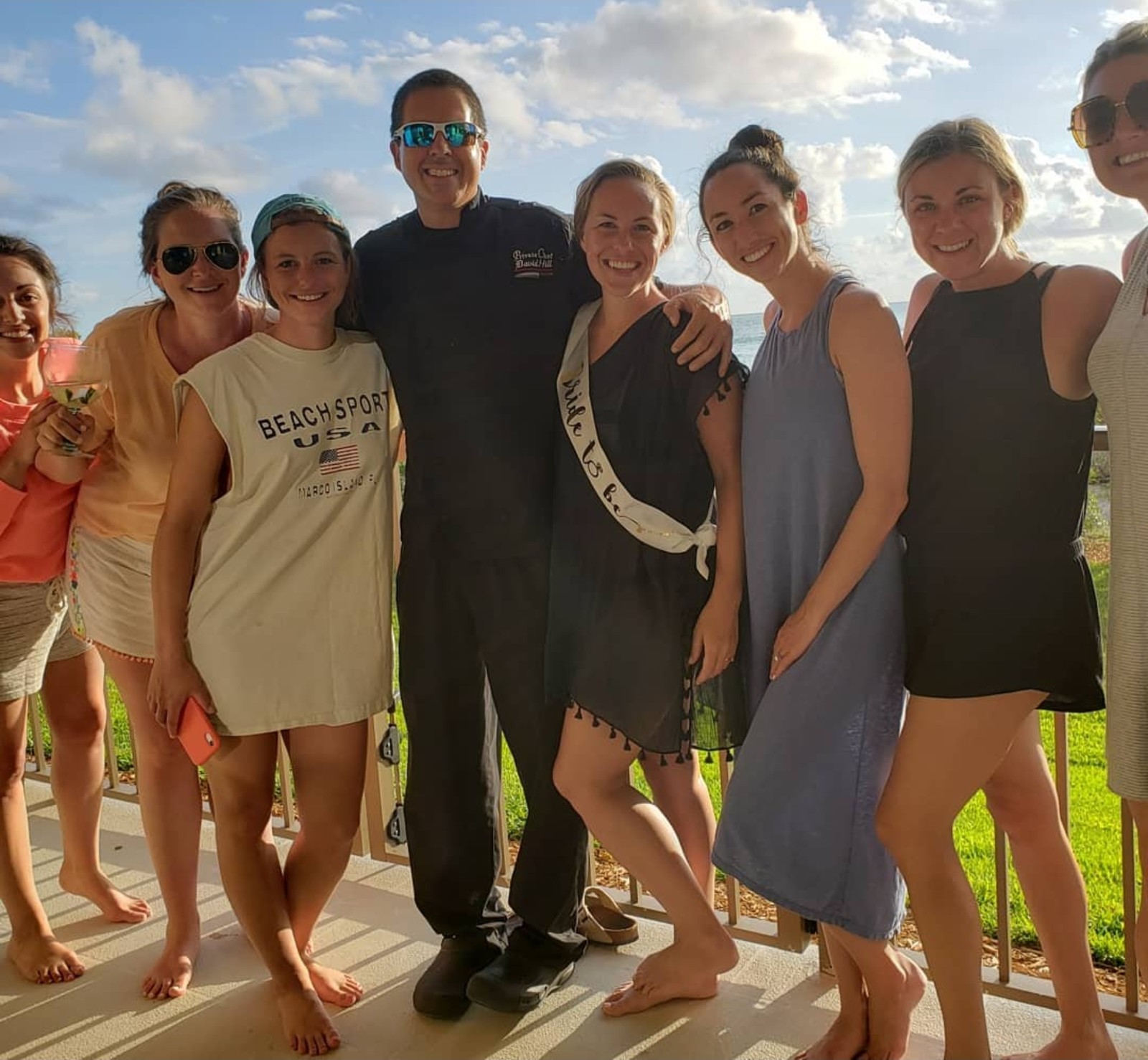 Chef David Hill with bride-to-be and guests on the deck