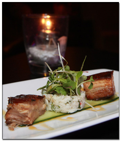 Pork belly entrée with micro greens