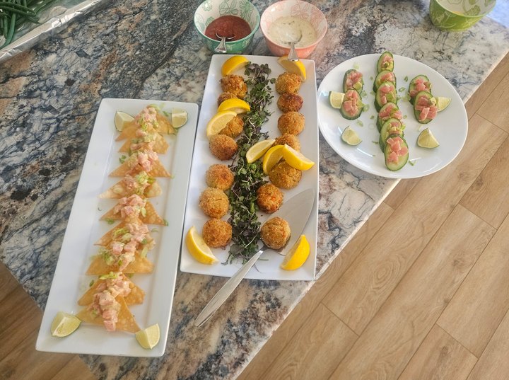 Appetizer trays on a granite counter