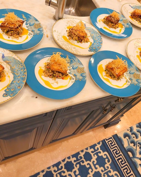 Plated appetizers on blue-patterned china