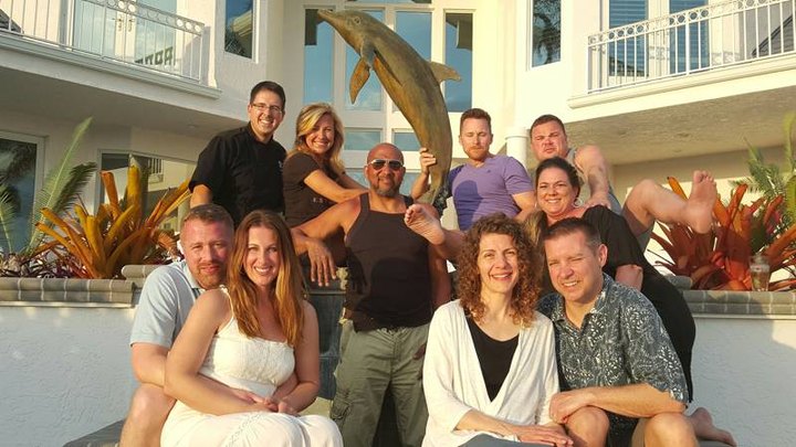 Family outside an island home
