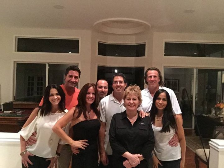 Guests posing in a vacation home