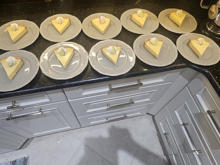 Key lime pie slices plated for guests