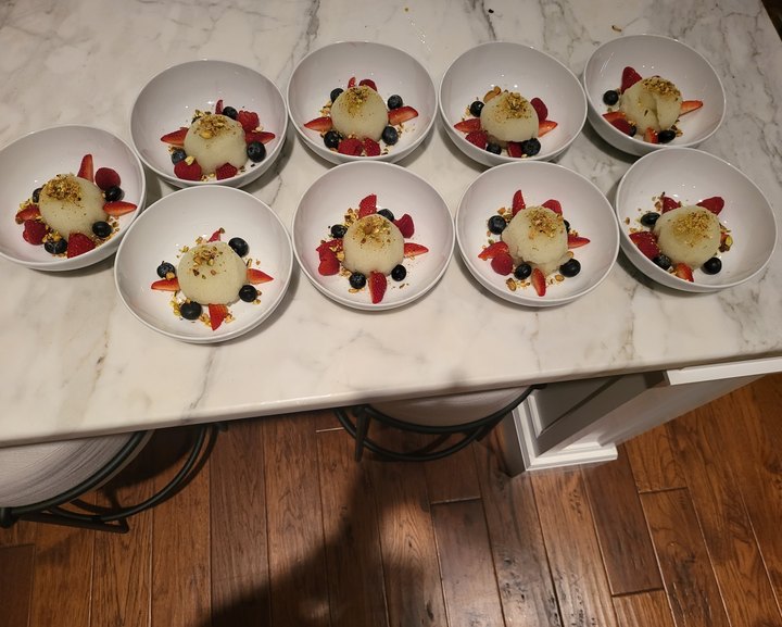 Plated desserts with berries on the island